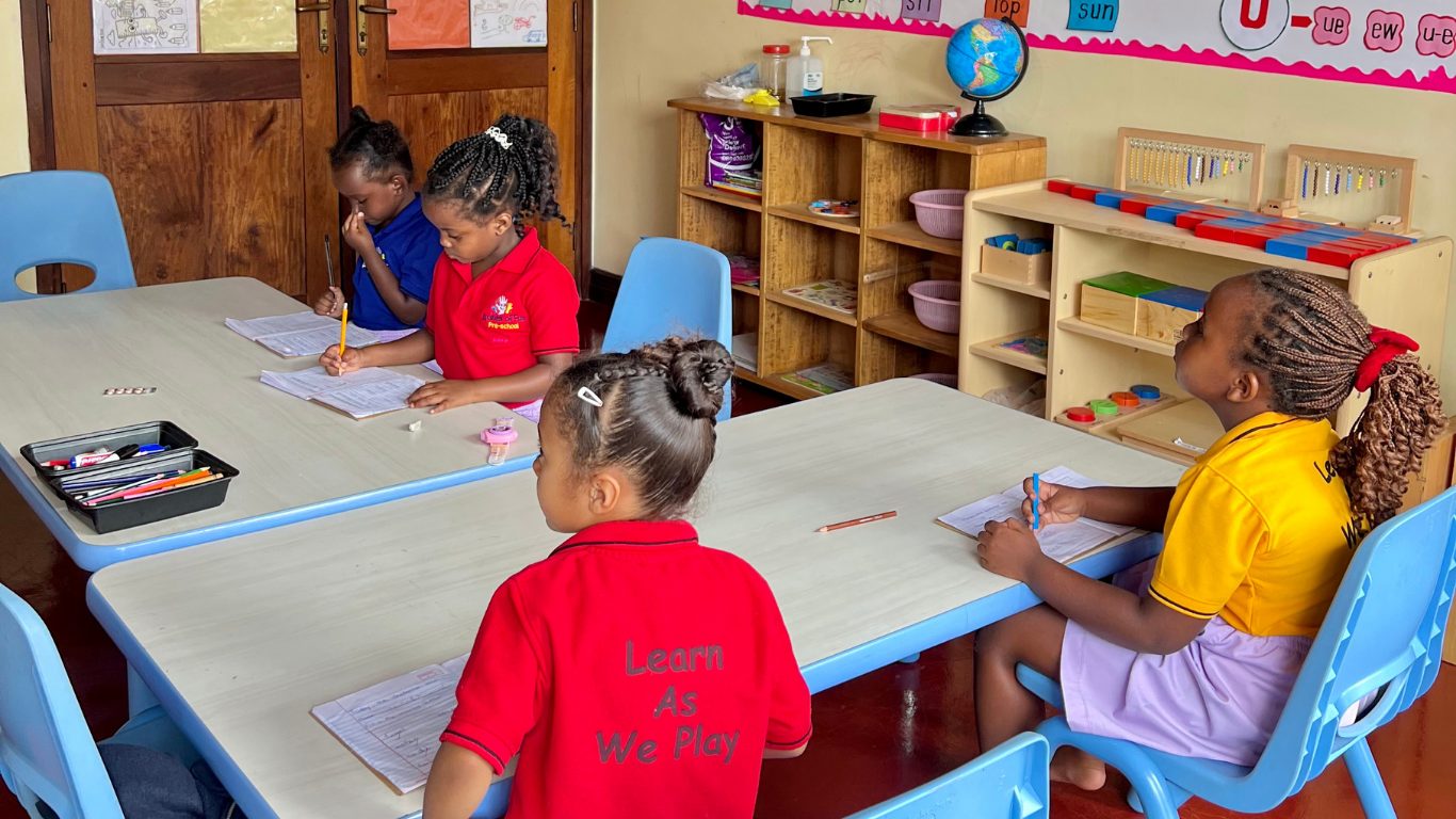 Kindergarten class during a lesson at the whiteboard